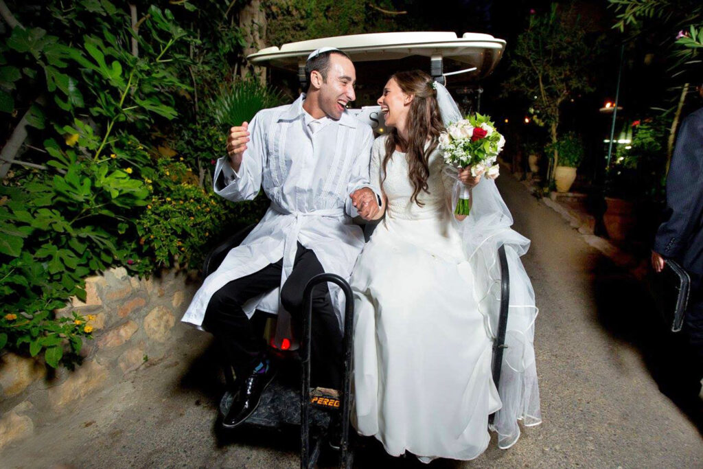 A newlywed couple sharing a joyful moment