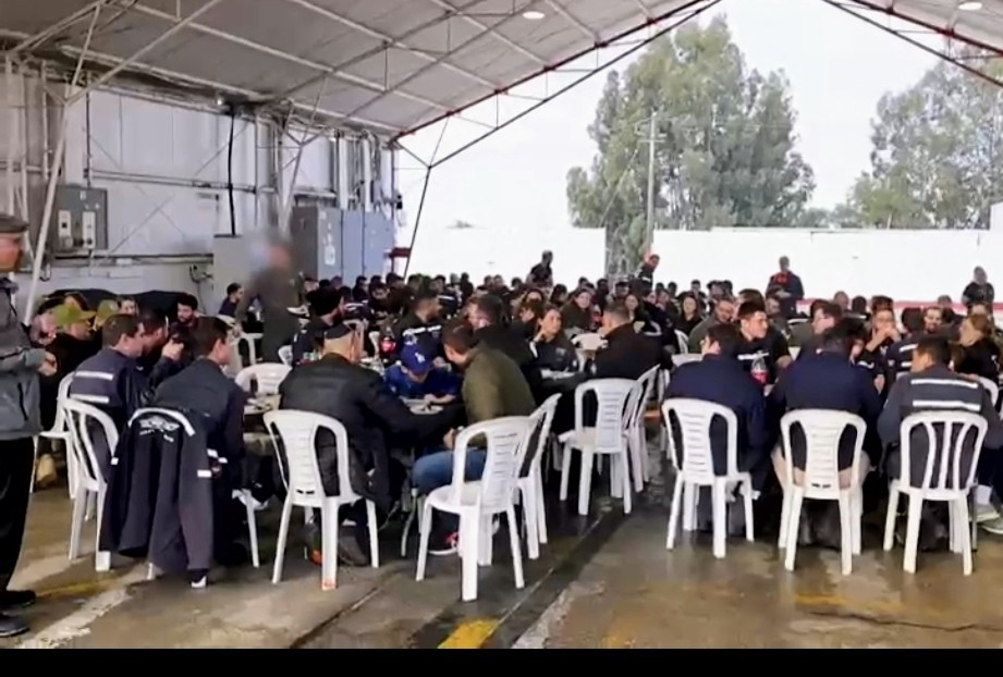 Guests gathered around tables for an army base celebration