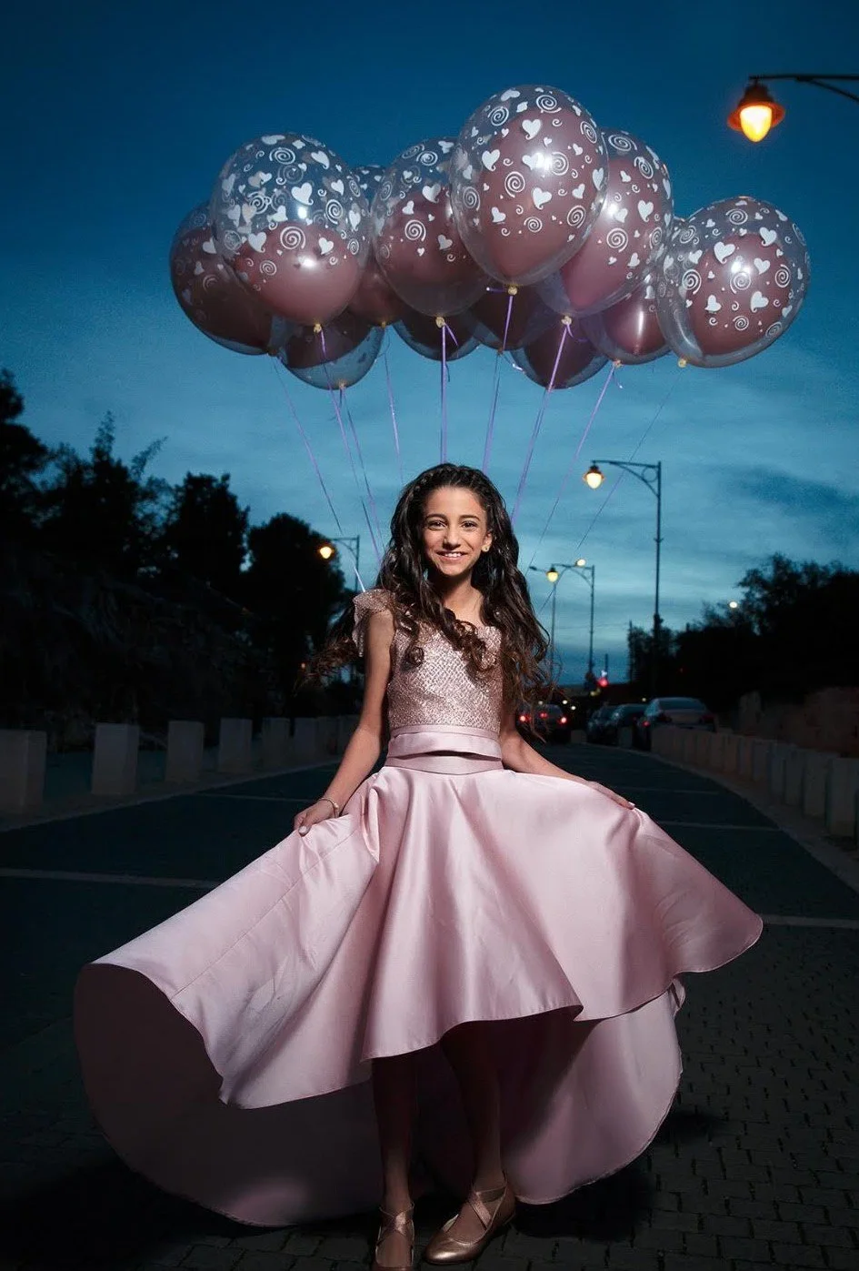Bat Mitzvah girl with pink balloons