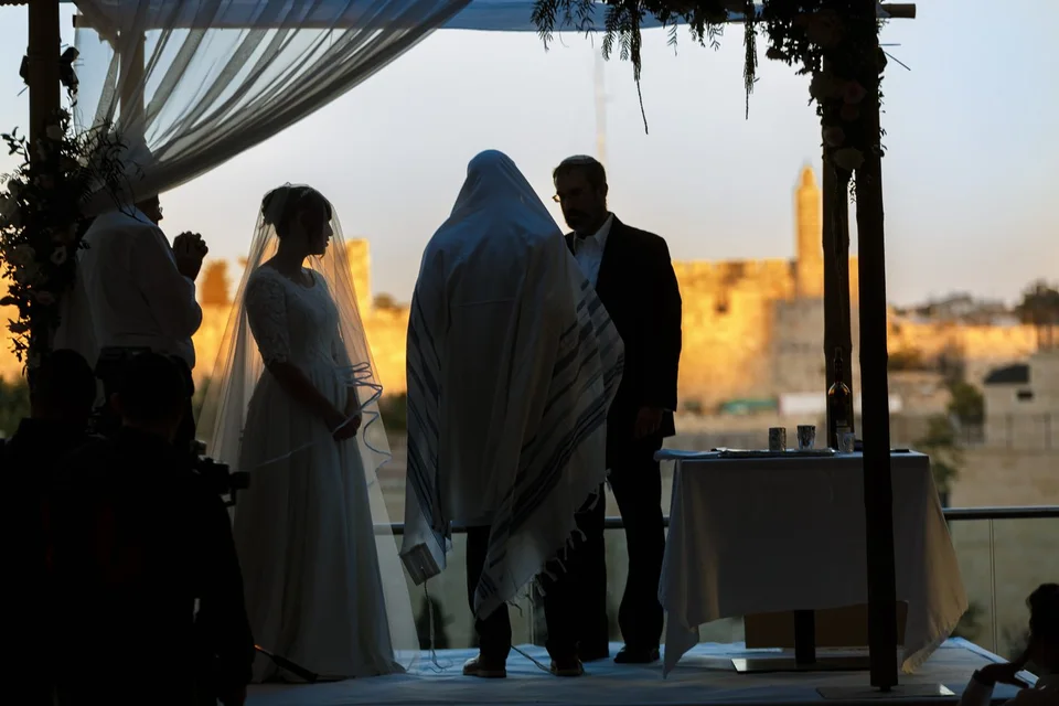 A wedding ceremony at sunset
