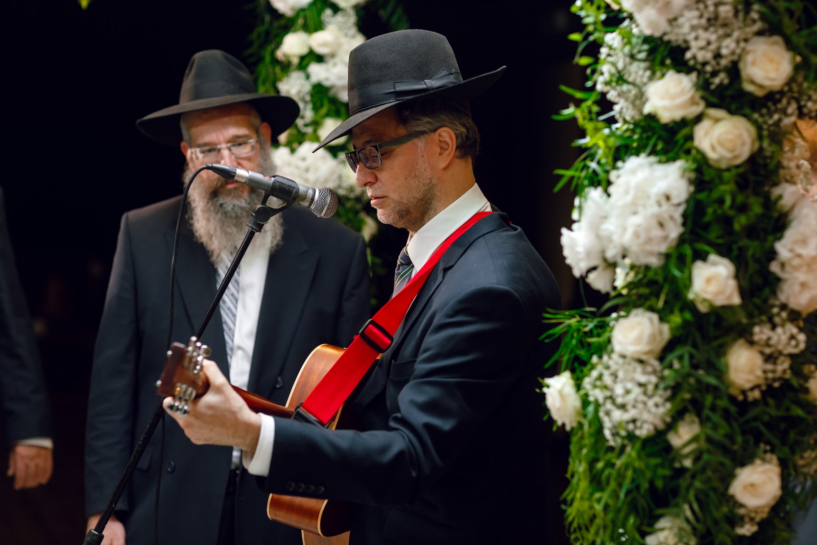 A wedding ceremony beneath the chuppah
